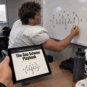 The Gap Scheme Playbook beside a coach teaching at a whiteboard